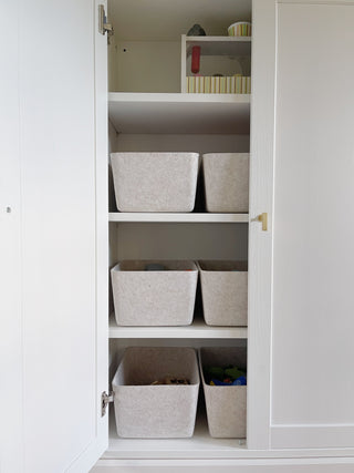 Beige Wide Sculpted Bin in a shelf