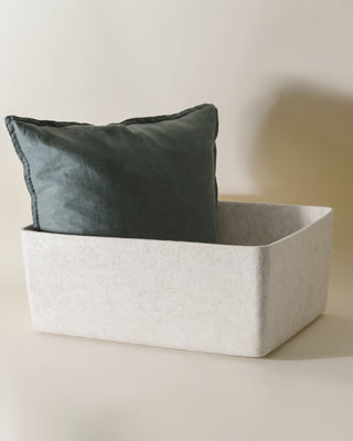 Oatmeal colored XL bin with pillow inside