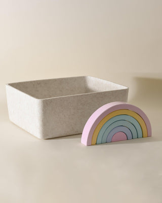 Beige Large Sculpted Bin with item besides it