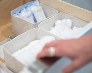 Beige Petite Flex Bins in a shelf